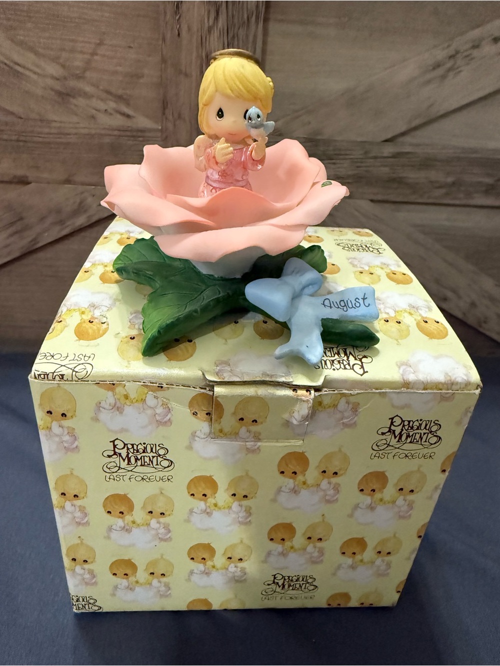 Precious Moments Pink Rose Figurine with Blue Bow 'August'
